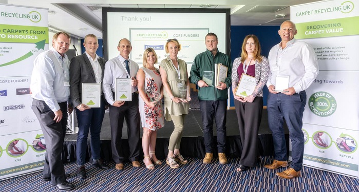 Left to right: David Judge, Cormar Carpets, Jack White, Floorstore Group on behalf of winner Steve Walker, Stuart Thomas, Designer Contracts, Kate Burnett, Milliken, Ellen Petts, Greenstream Flooring, Tony Spreckley, Envirocycle London, and Sue Jaques, and Andy Murphy of Melrose Textile. © Carpet Recycling UK